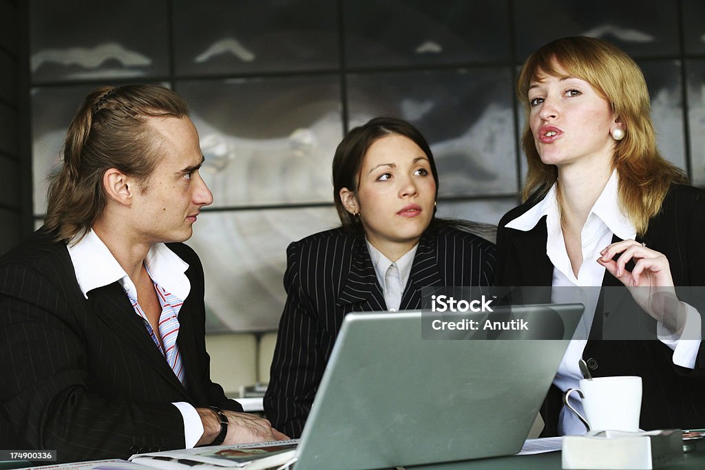 discussing business strategy Adult Stock Photo