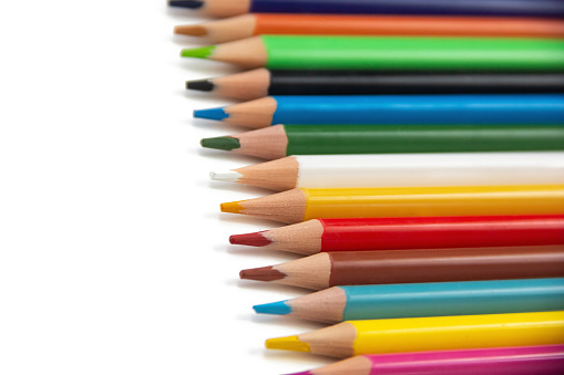 colored pencils on a white background close-up