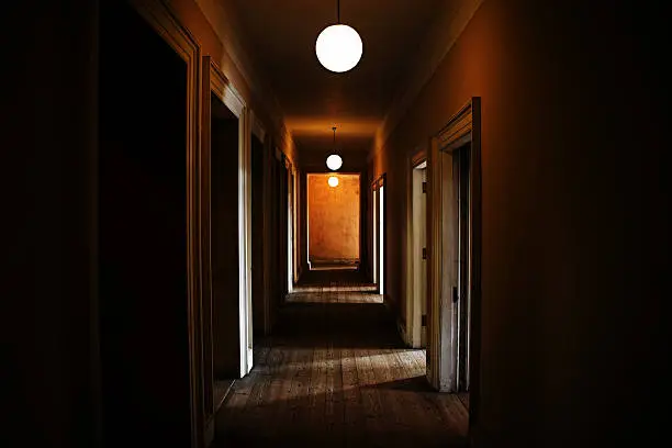 Very dark and creepy corridor.
