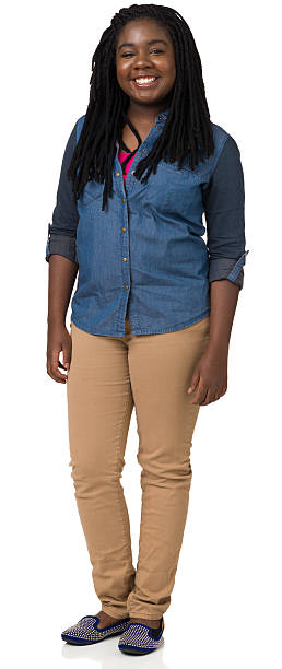 Smiling Young Woman Full Length Portrait Portrait of a young woman isolated on a white background. double denim stock pictures, royalty-free photos & images