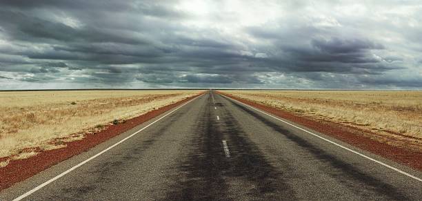 istock Long straight Road on Australia's Stuart Highway 174901506