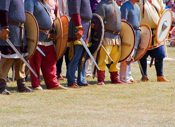 istock Barbarians and Vikings with swords. 174901575