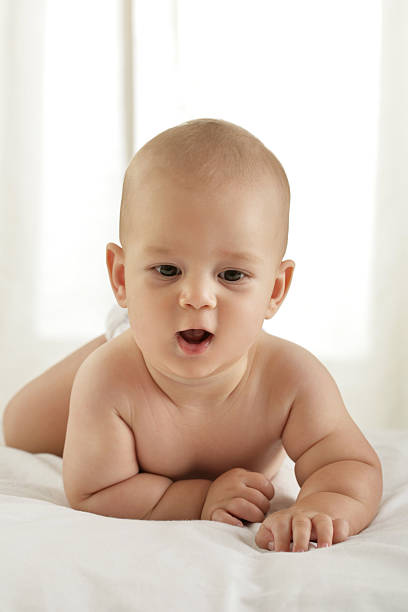 Crawling Baby Boy stock photo