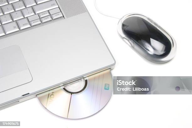ラップトップコンピューターのシリーズ白い背景に - CD-ROMのストックフォトや画像を多数ご用意 - CD-ROM, カットアウト, クローズアップ