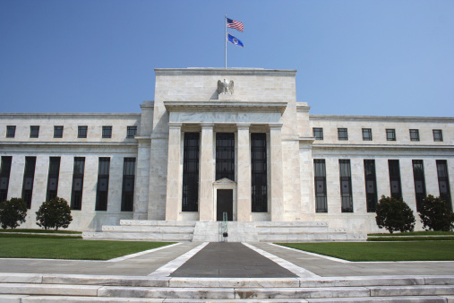 Front View of the US Federal Reserve in Washington DC on a day too hot to think about the money supply or inflation