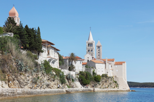 ocean view of mediterranean medieval fortress and church  Rab Croatia