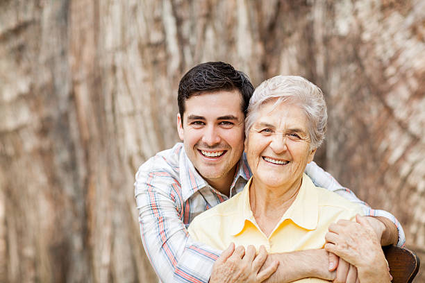 istock Loving grandson hugging his grandmother 174902977