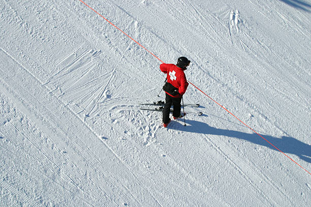 Ski Partrol Ski Patrol on duty at Spirit Mountain, Duluth, Minnesota ski patrol photos stock pictures, royalty-free photos & images