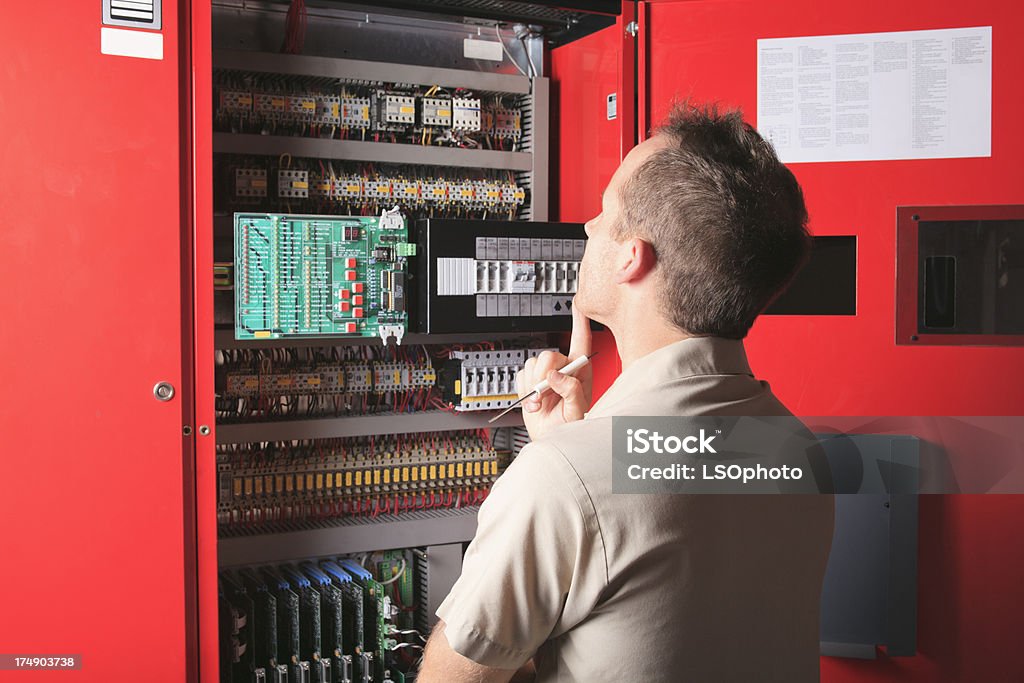 Repairman - Elevator Thinking Control Panel Stock Photo