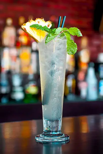 Photo of Linchburg Lemonade cocktail on the  classic black bar table