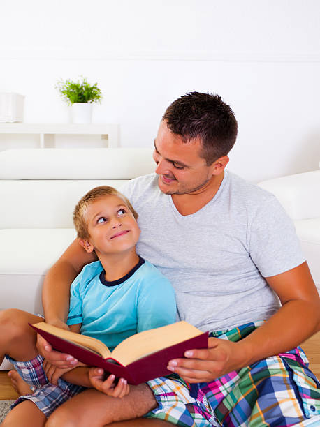 istock Father reading to his son 174903878