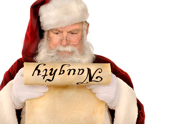 istock santa with naughty list 174904293