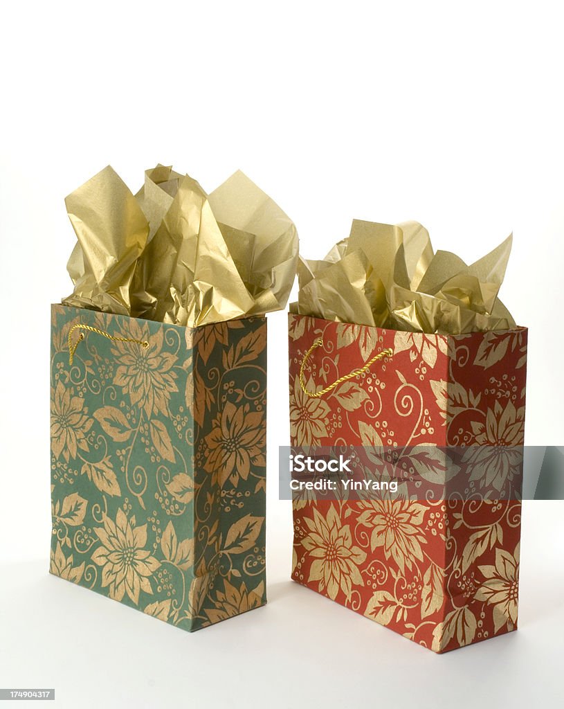 Christmas Gift Bags With Gold Tissue Paper Wrapped Holiday Presents Stock  Photo - Download Image Now - iStock