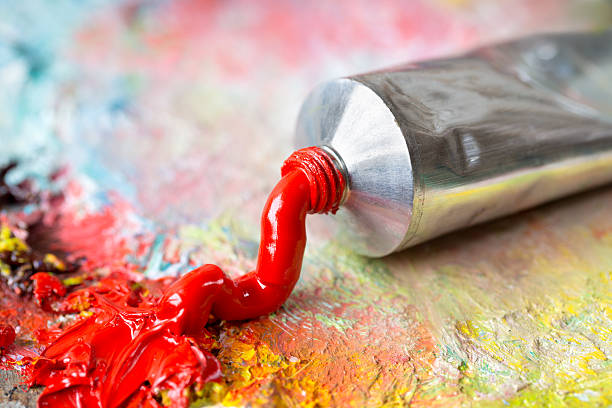 istock Red oil paint on a classical palette 174904368