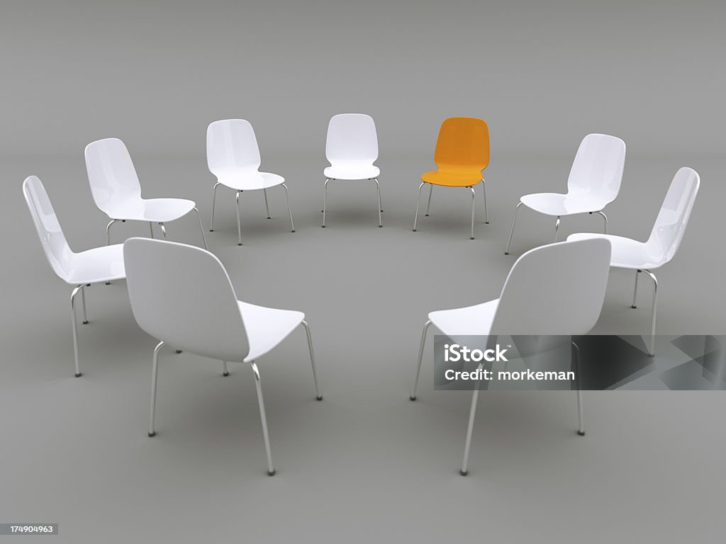 chairs in a circle Chairs in a circle with focus on the orange coloured.chair concept related lightbox: Chair Stock Photo