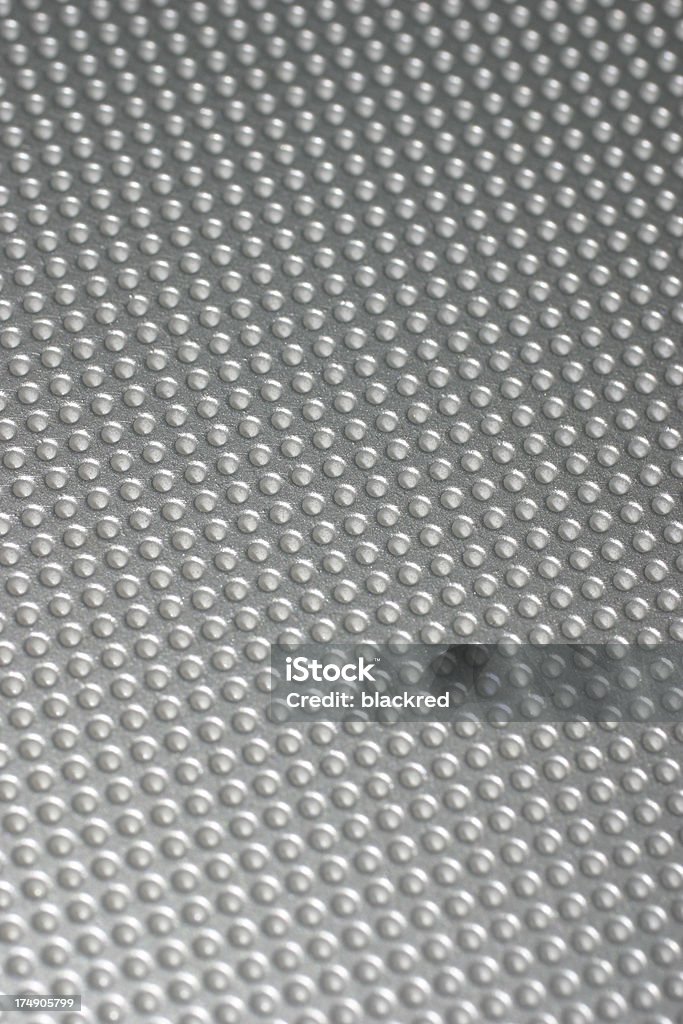 Speaker Mesh Close-up on chrome speaker mesh. Abstract Stock Photo