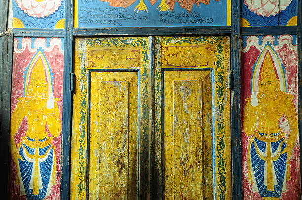 Dambulla,Sri Lanka. Hand painted screen from the 1st century BC placed in cave 1 of the Royal Rock Temples a world UNESCO sight. dambulla stock pictures, royalty-free photos & images