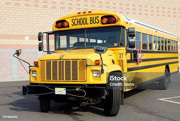 Yellow Behemoth Stock Photo - Download Image Now - Bus, Front View, School Building