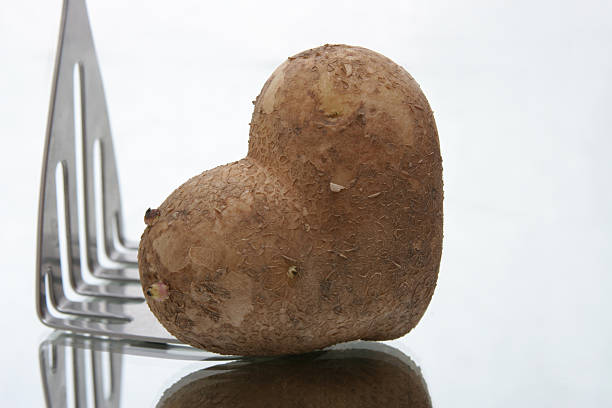 美味しいお食事 - heart shape raw potato food individuality ストックフォトと画像