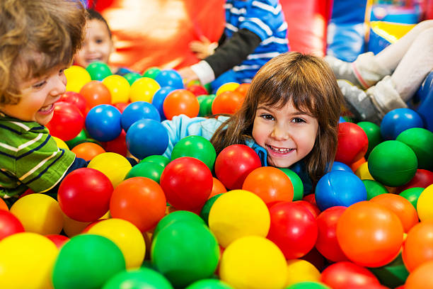 istock Children playing in the ball pool 174906383