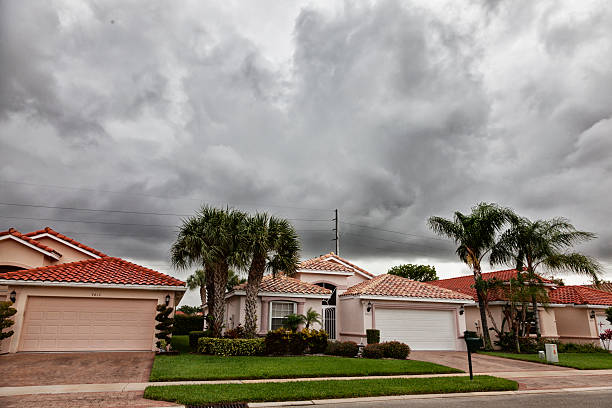 istock houses in Florida dark cloudy sky 174906416