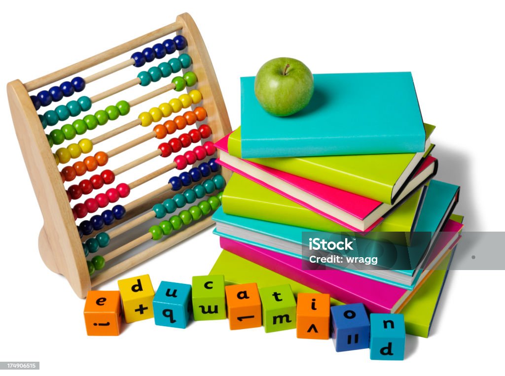 Education with a Abacus and pile of Colourful Books A pile of colourful books with a green apple and abacus and the word education in children's building bricks. Isolated on white.Click on the links below to see more of my education and abucus images. Abacus Stock Photo
