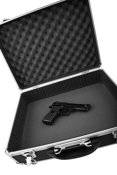 Hitman's Weapon Picture of a metal briefcase with gun. wack stock pictures, royalty-free photos & images