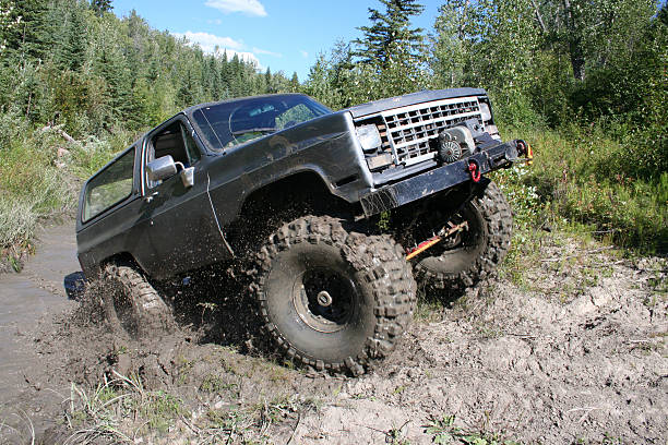 istock 4X4 truck driving  in mud. 174906987