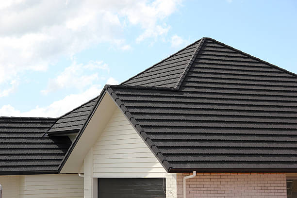istock Metal tile roof on new house 174907635