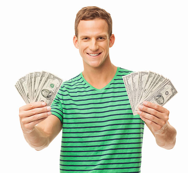 istock Man Holding US Currency Banknotes - Isolated 174908115