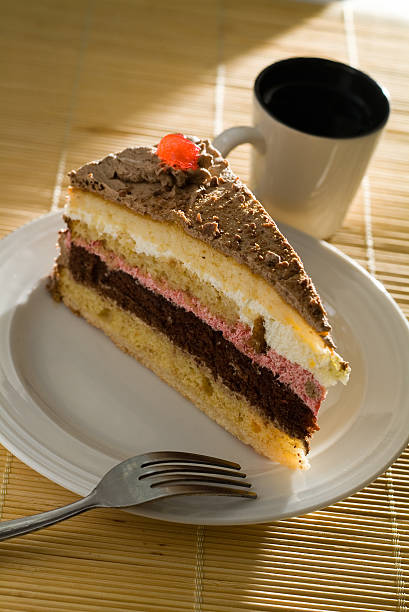 istock A slice of German cake with coffee 174908149