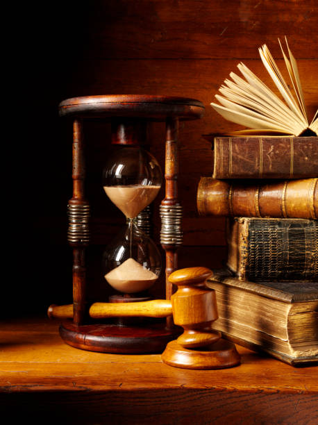 istock Gavel and Mallet on a Desk with Antique Books 174908364