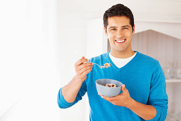 istock Happy Man Having Bowl Of Cereals 174908366