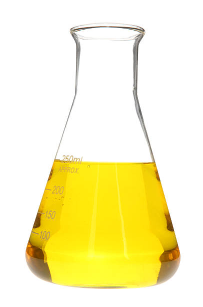 istock Yellow chemicals in glass beaker 174908579