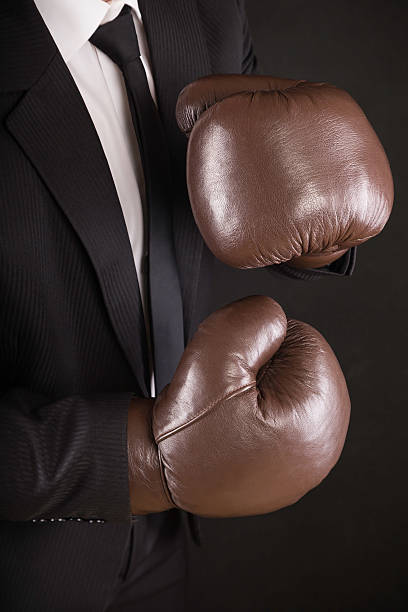 istock businessman with boxing gloves 174908907