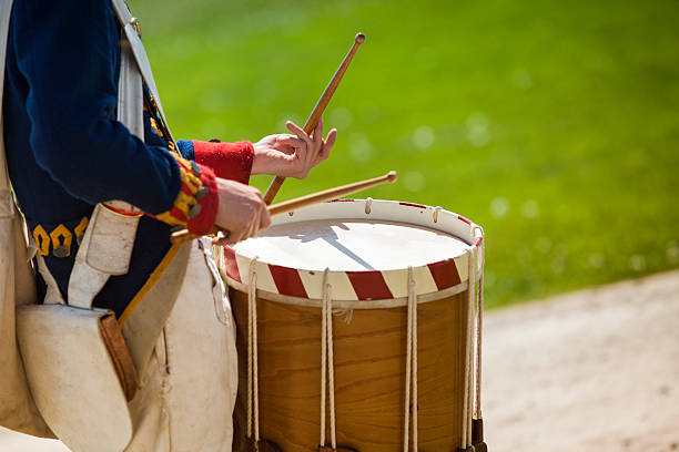 Drum on a parade re-enactment Fife and drum march at an old fort in a military re-enactment in Niagara Falls reenactment stock pictures, royalty-free photos & images