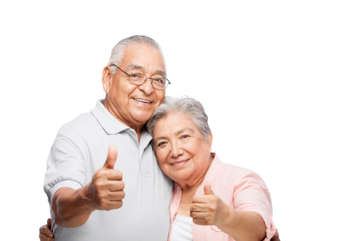Senior couple making thumbs up