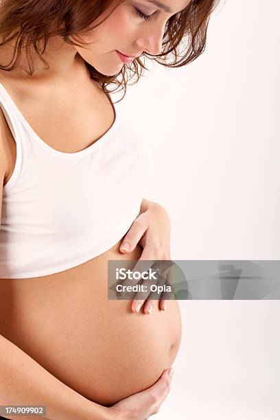 Young Pregnant Woman Stock Photo - Download Image Now - Pregnant, 20-24 Years, 25-29 Years