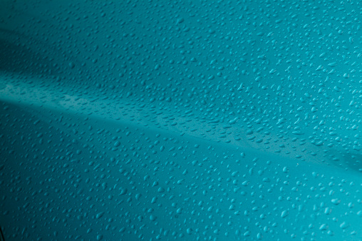 Tiny rain drops on a car hoodOther backgrounds