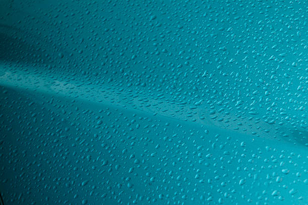 Rain drops on car stock photo