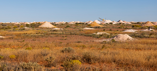 Opal mounds on the landscape in Coober Pedy, South Australia, Australia