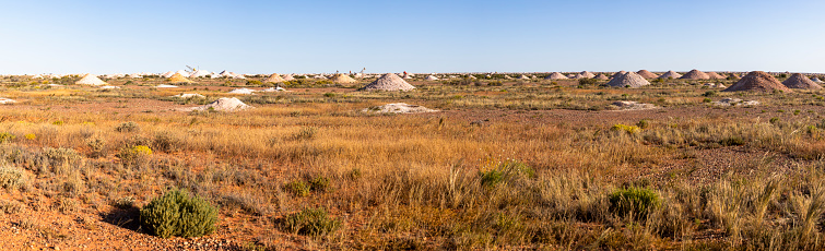 Opal mounds on the landscape in Coober Pedy, South Australia, Australia