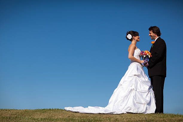 istock Side View of Bride and Groom, Outdoors, With Cop 174911129
