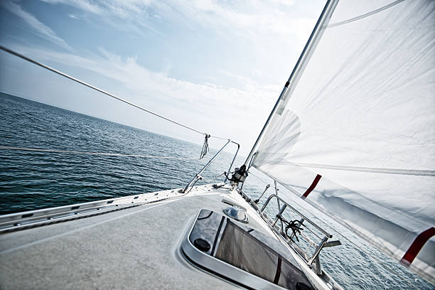 Standing on a sailboat deck during sailing trip