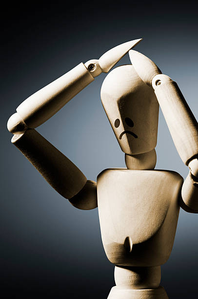 istock Manequin expressing despair with hands on head 174912138