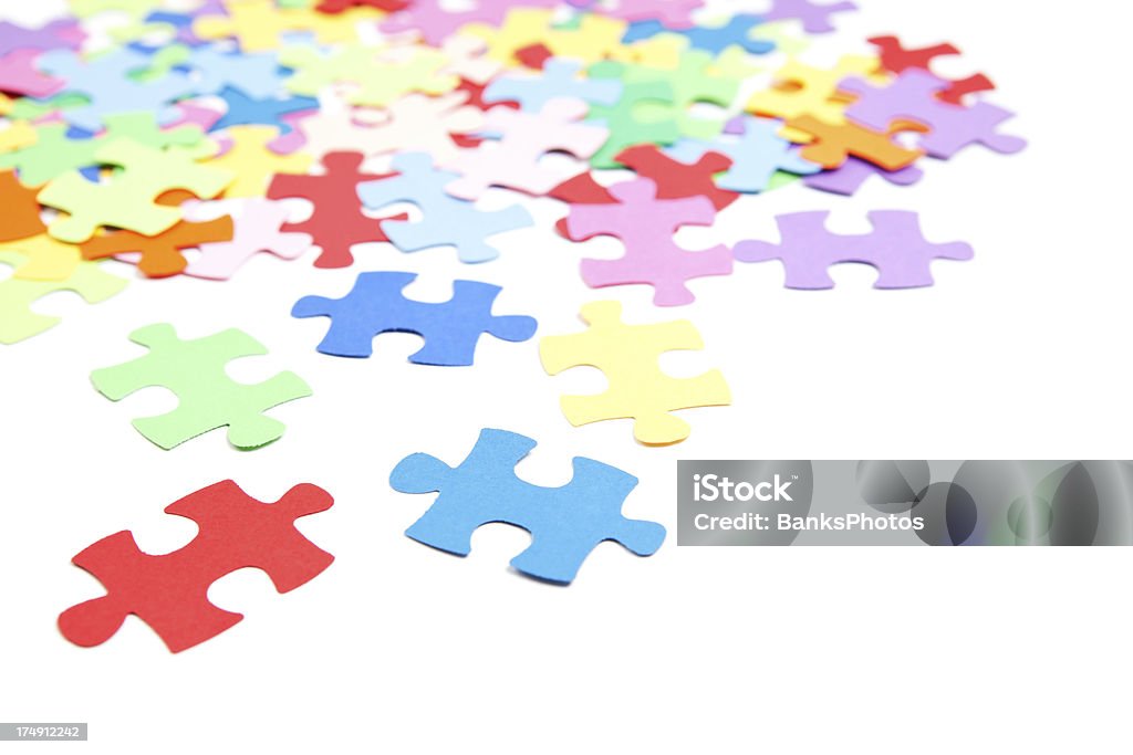Colorful Puzzle Pieces Isolated on White  Abundance Stock Photo