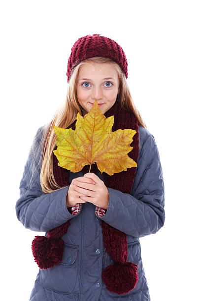 portrait of freckled teenage girl in the autumn park