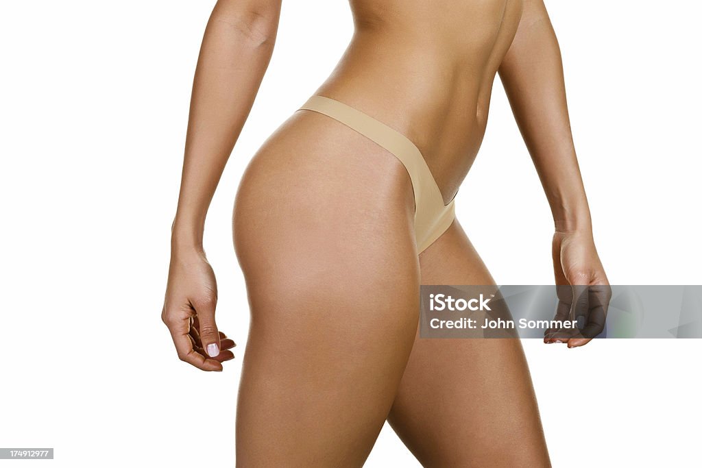 Profilo di femmina corpo - Foto stock royalty-free di Abbronzatura