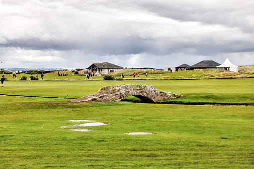 St Andrews, Scotland - September 22, 2023: The iconic 18th hole stone bridge on the Old Course in St Andrews Scotland