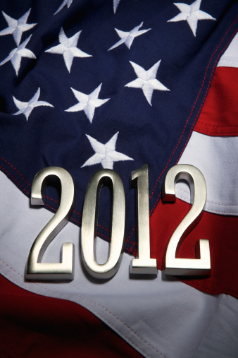 American presidential elections 2012 marked with silver numbers on textured American flag